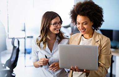 photo of two women talking